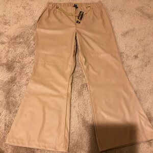 Faux leather bell bottom pants with front chain attached